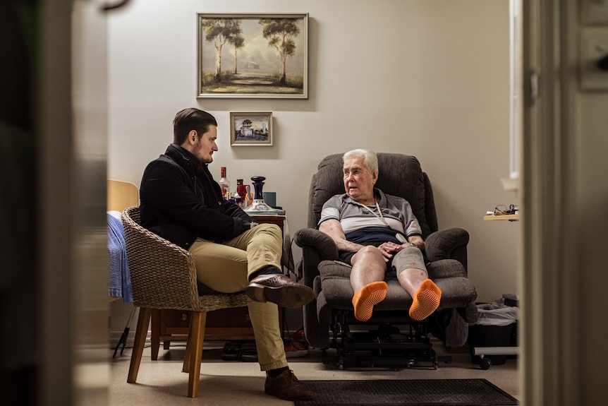 Jayden Evans and Neville Lorensen chat together in Neville's aged care home