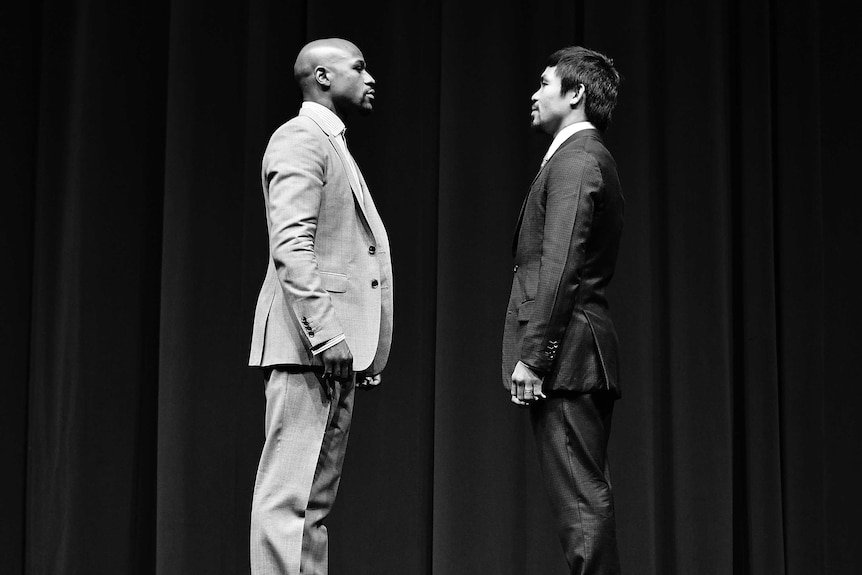 Manny Pacquiao and Floyd Mayweather face off