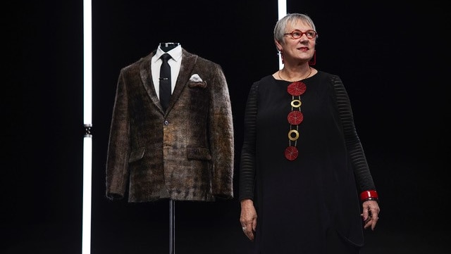 Artist Pamela Kleemann-Passi and the jacket made of moustache hair taken from her fabric construction