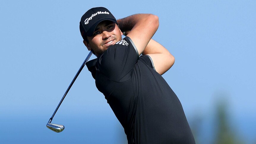 Hot form .. Jason Day plays his shot from the fourth tee during his final round
