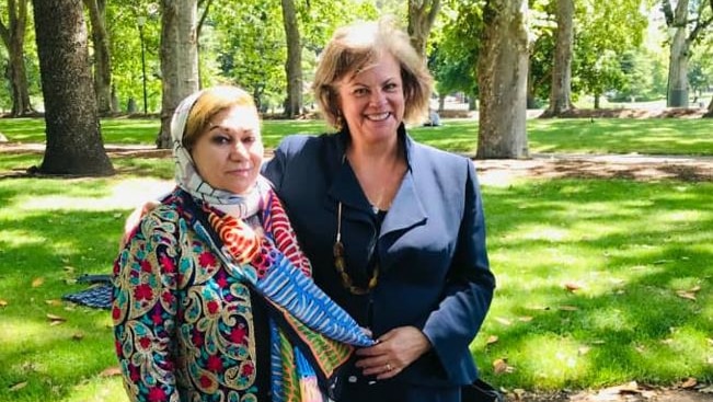Judges Shakila Abawi Shigarf and Robyn Tupman are seen with a park in the background.