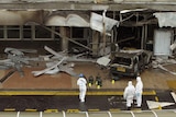 British attack: Forensic officers examine the scene of an attack on the terminal building at Glasgow Airport