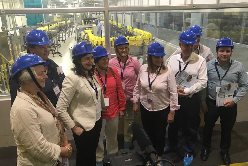 Annastacia Palaszczuk and regional Queensland mayors at a plant in Mundara