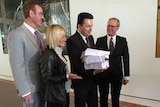 Nick Xenophon receives the petition