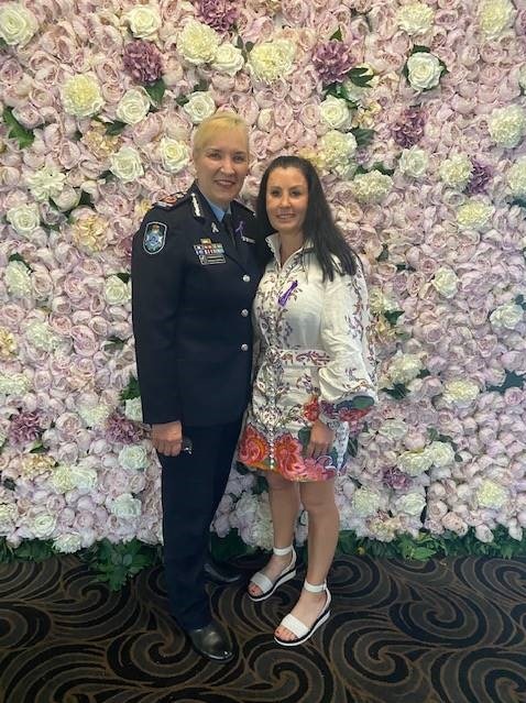 Queensland Police Commissioner Katarina Carroll with domestic violence survivor Simone O'Brien.