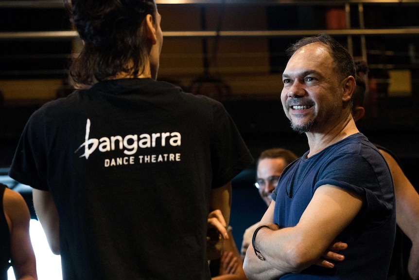 Artistic director Stephen Page talks to a performer during rehearsals of Bennelong.