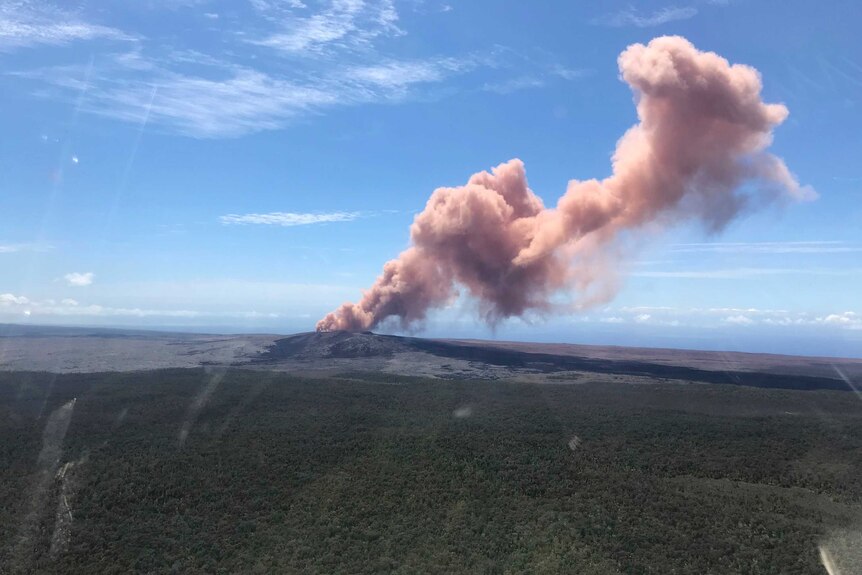 Smoke rises above a volcano in Hawaii
