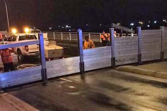 A flood gate being installed on Charles Street bridge Launceston