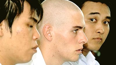 Lawyers for Tan Duc Thanh Nguyen (r), Matthew Norman (c) and Si Yi Chen (l) claim that mistakes in law were made. (File photo)