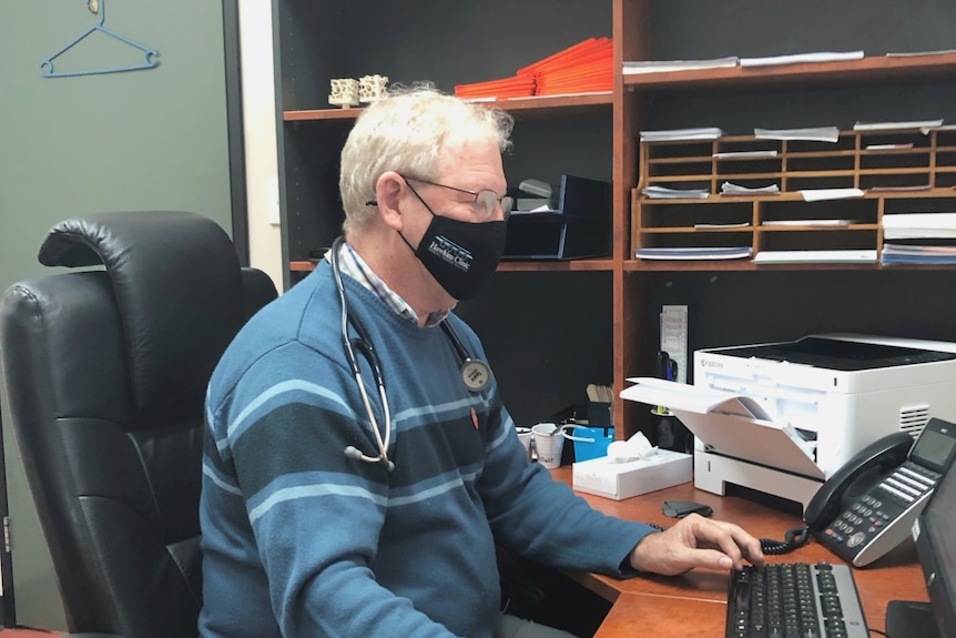 Doctor sitting at desk