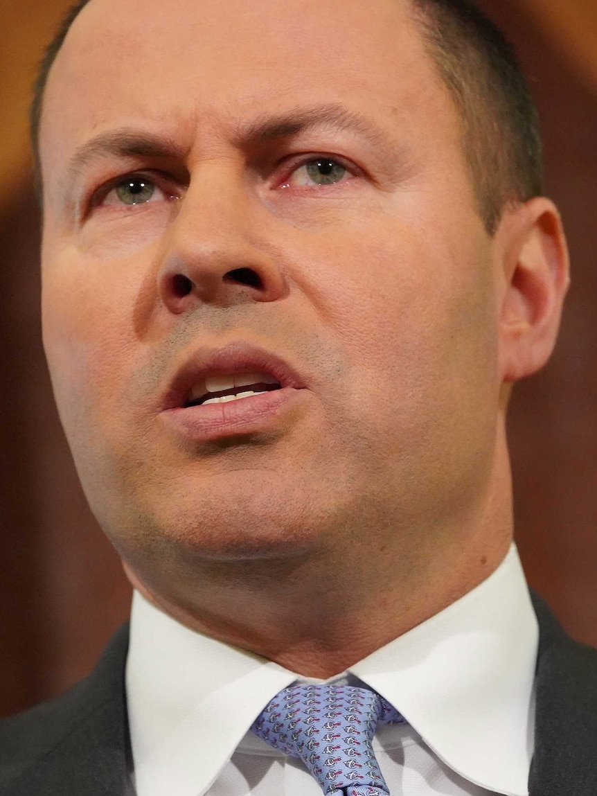 A close up of treasurer Josh Frydenberg speaking