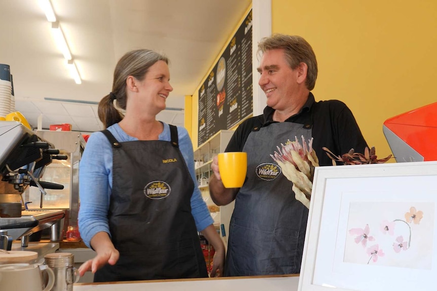 Morawa roadhouse owners Nicola and Jamie Appleton share a laugh and a coffee at their business in Morawa.