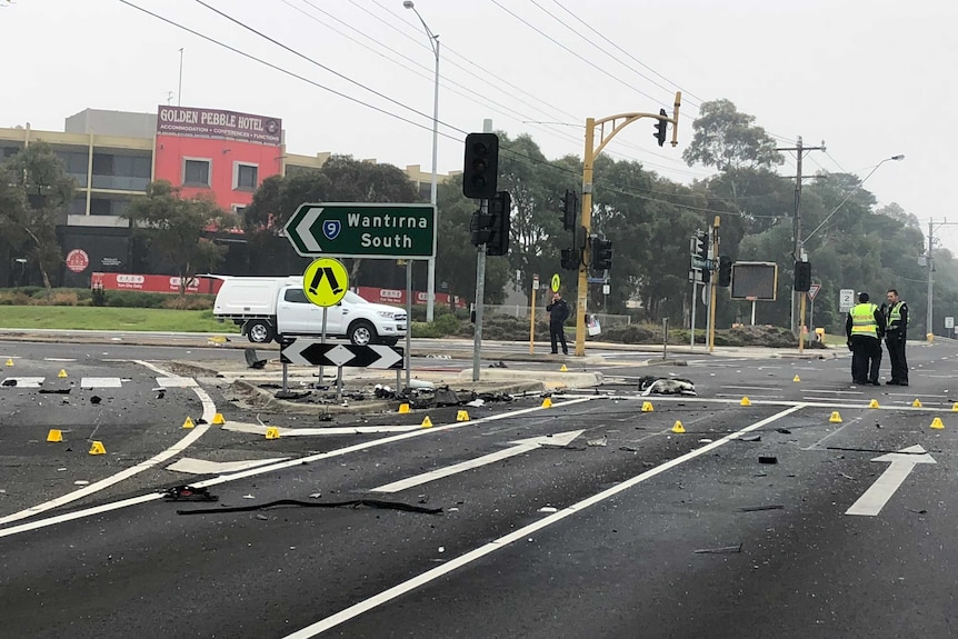 Police traffic cones at the scene of a double fatal crash at Wantirna South.