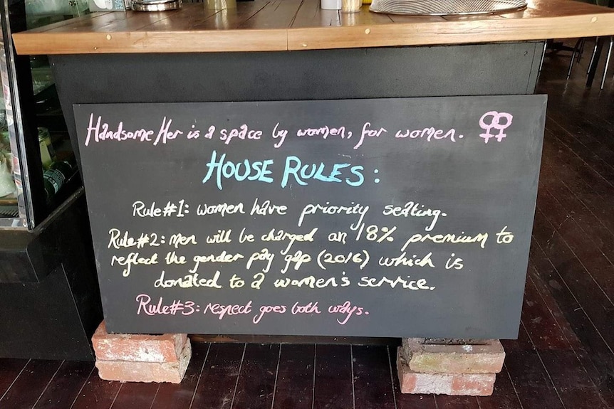 Cafe chalkboard writes House Rules.