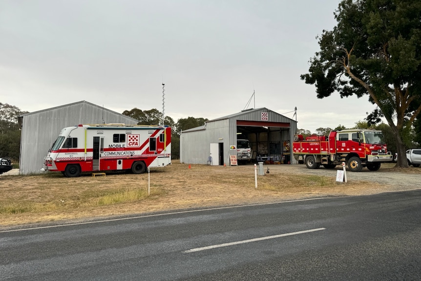 Fire vehicles outside sheds in a country town