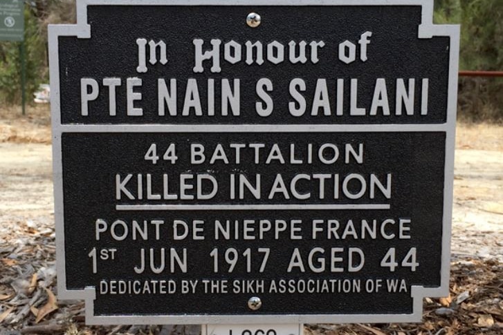 A plaque states 'In honour of Pte Nain S Sailani 44th battalion, killed in action, Pont De Nieppe France'