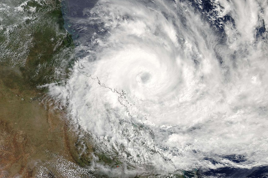 Satellite image of cyclone Debbie tracking toward the coast