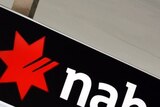 National Australia Bank signage outside a branch of the bank in central Sydney.