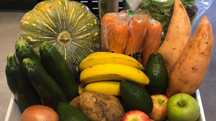 A box of fresh fruit and vegetables