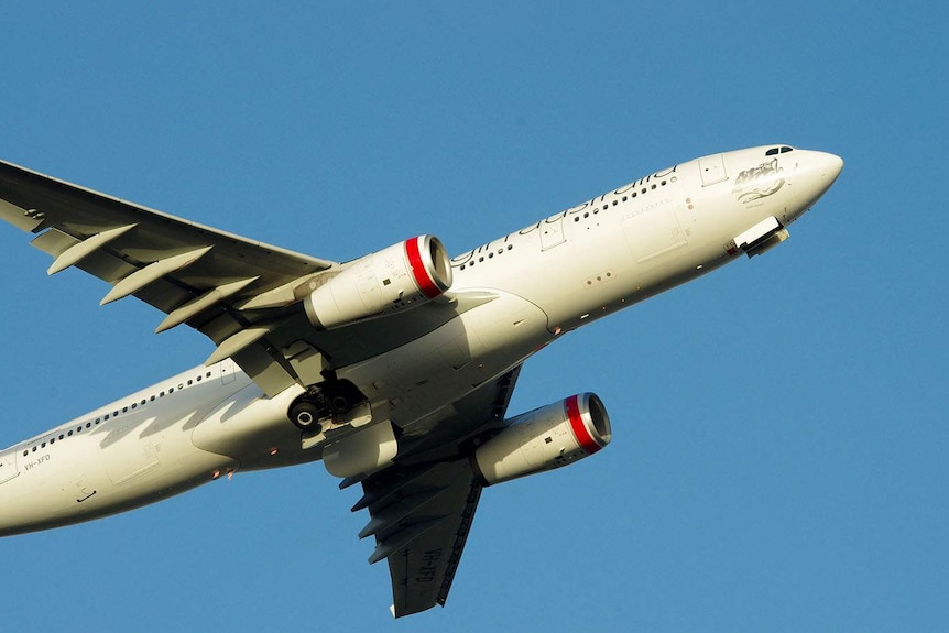 Virgin Australia airplane in the sky.