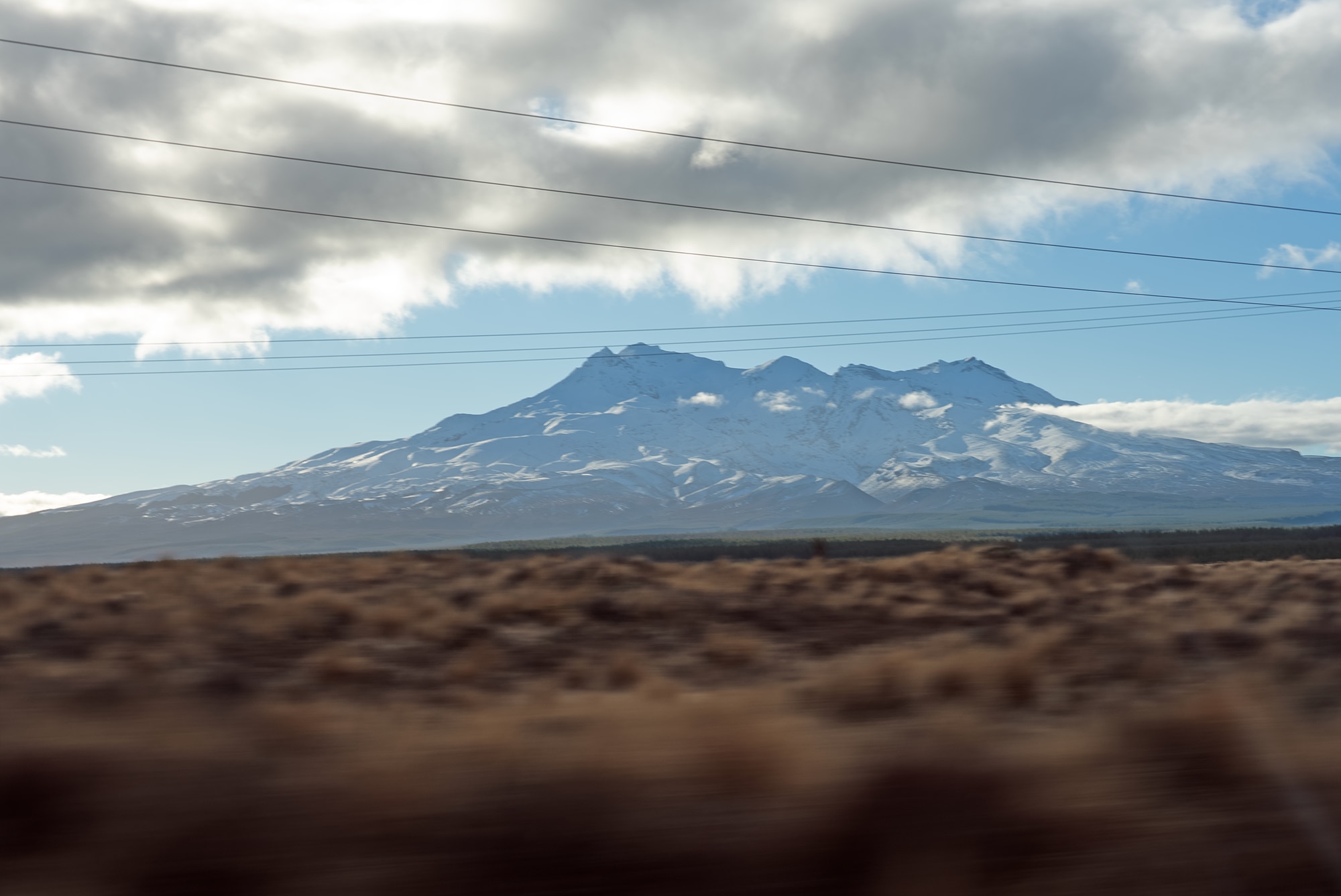 A rural New Zealand landscape with countryside stretching into the distance.