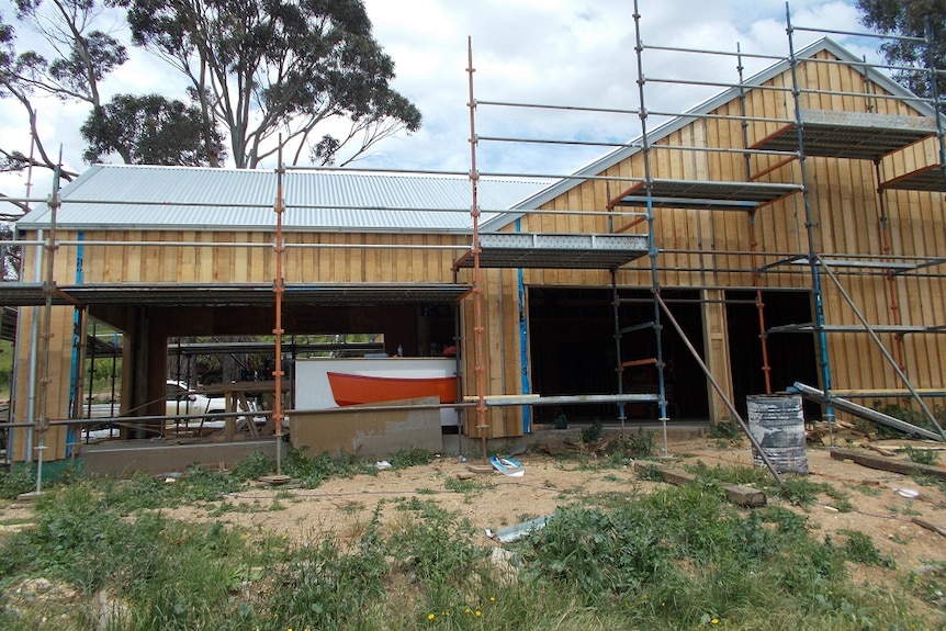 Scaffolding surrounds a new refurbished shearing shed at Derwent Estate Winery which will be used as a function centre