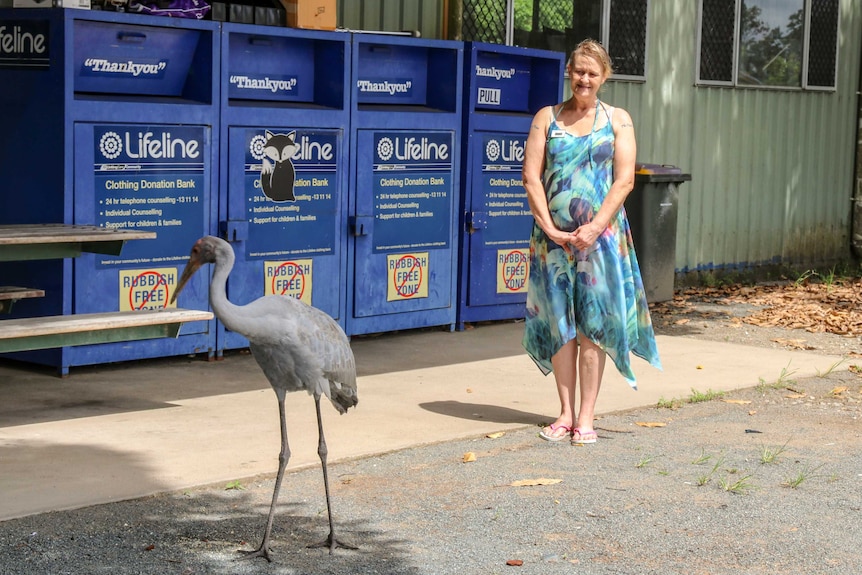 Mirani local Debbie Olsen watches the Brolga in front of Lifeline