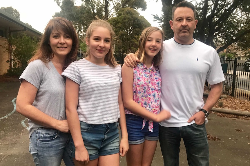 Daughters Bianca and Lauren stand between their mother Fiona and their father Andrew.