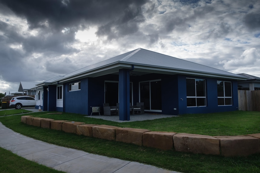 Blue and white 4-bedroom house.