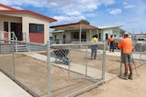 Workers build houses in Kowanyama Indigenous community on Queensland's western Cape York in November 2013.