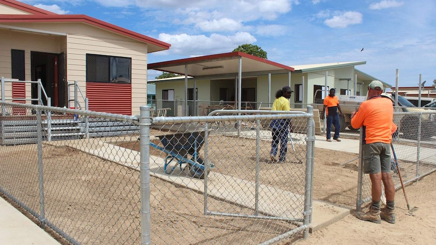 Workers build houses in Kowanyama Indigenous community on Queensland's western Cape York in November 2013.
