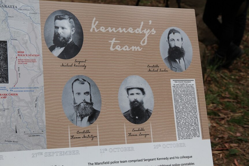 Signs at new Stringybark Creek Reserve Memorial show faces of four policemen involved in Kelly Gang shootout in 1878.
