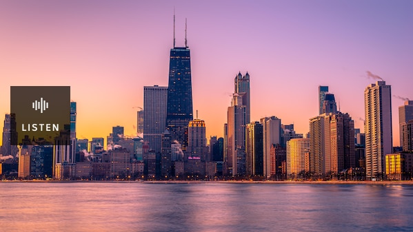 a view of the Chicago skyline at sunrise. . Has Audio