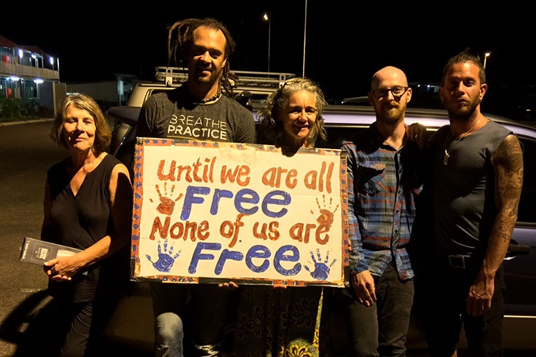 Michael Franti with members of DASSAN