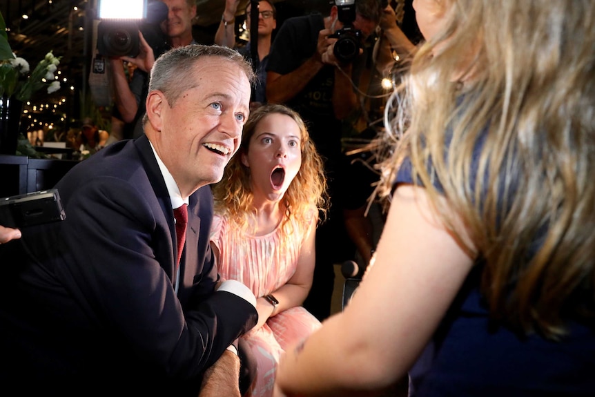 Bill Shorten and Nadia Clancy looked shocked and amused and what two, partially pictured, children have said.