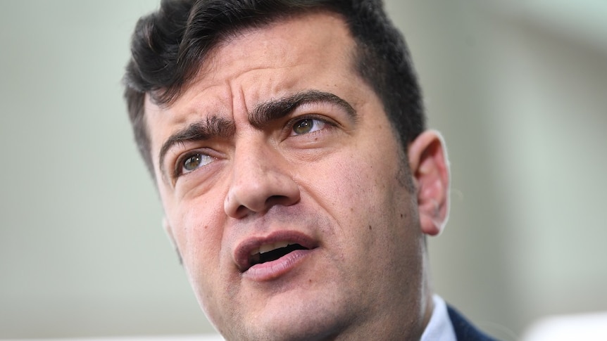 A close-up of Sam Dastyari frowning.