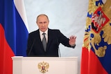 Russian president Vladimir Putin addresses parliament