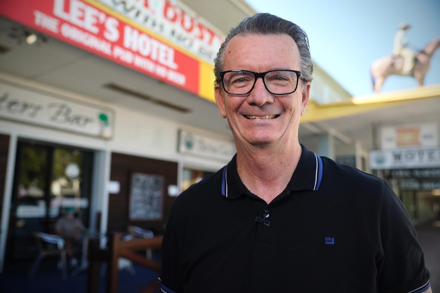 Publican Glenn Connell stands outside the Lee's Hotel in Ingham, the 'Pub with no beer'.