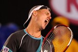 Marathon exit: Lleyton Hewitt falls to old foe Nalbandian after five sets and nearly five hours on Rod Laver Arena.