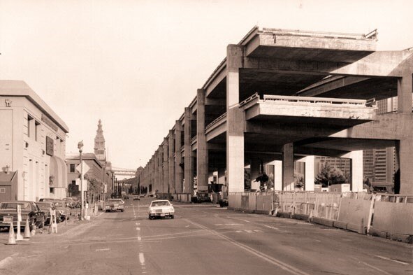 Black and white image of double decker freeway.