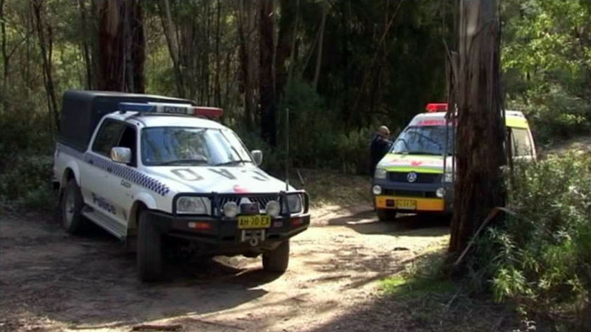 The bodies of a man and his three children have been found in car in a NSW south coast driveway.