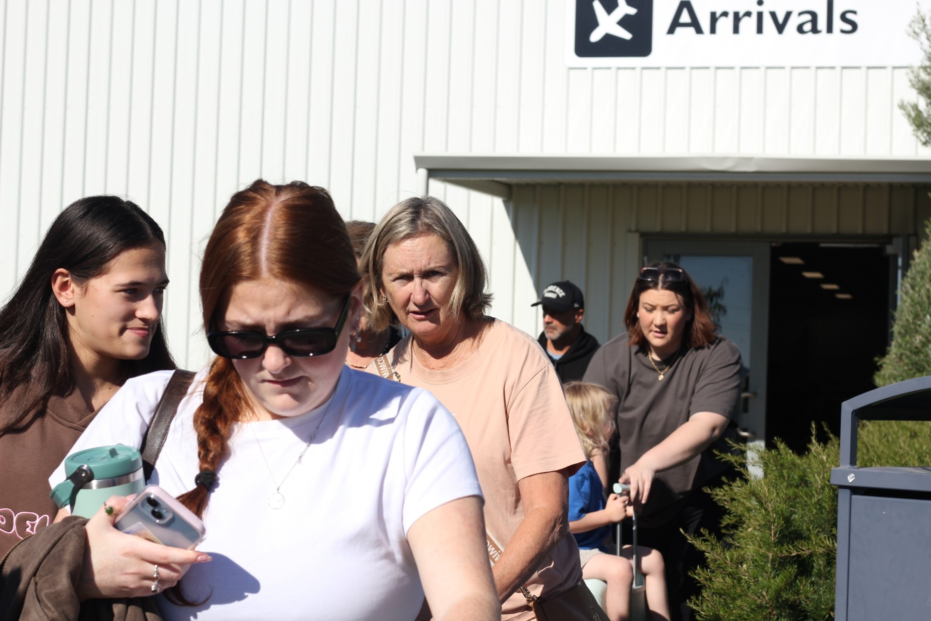 Passengers arrive at Busselton Airport after the flight from Sydney.