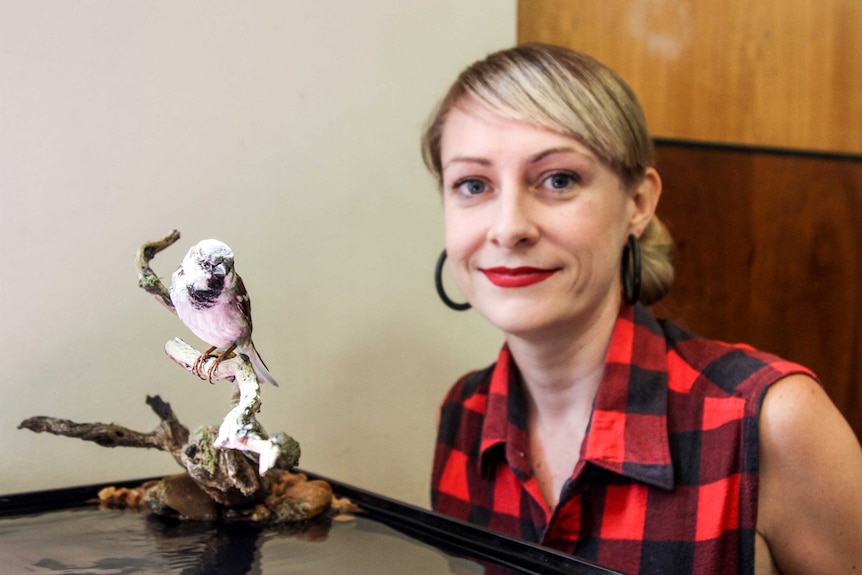 Natalie Delaney-John with her common sparrow.