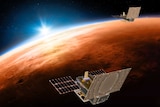 An artist's impression of two small satellites flying over Mars.