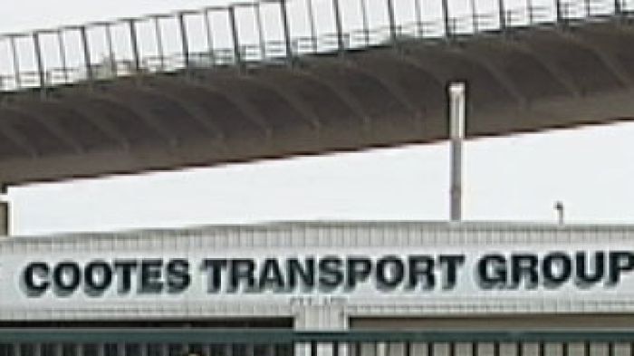 Cootes Transport, owned by McAleese, trucks at terminal in Spotswood, Victoria