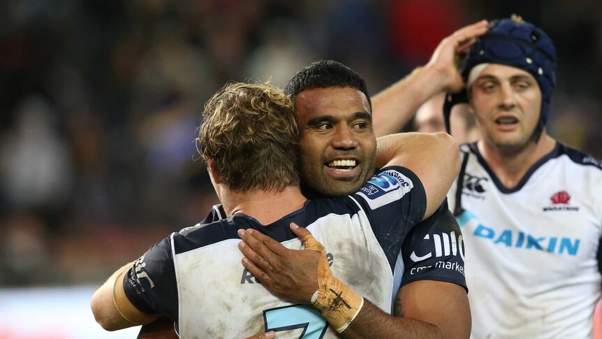 Waratahs players celebrate against the Stormers at Newlands in Cape Town.