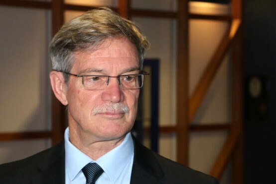 WA Opposition leader Mike Nahan standing in front of an uncladded wall.