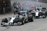 Nico Rosberg drives ahead of Lewis Hamilton