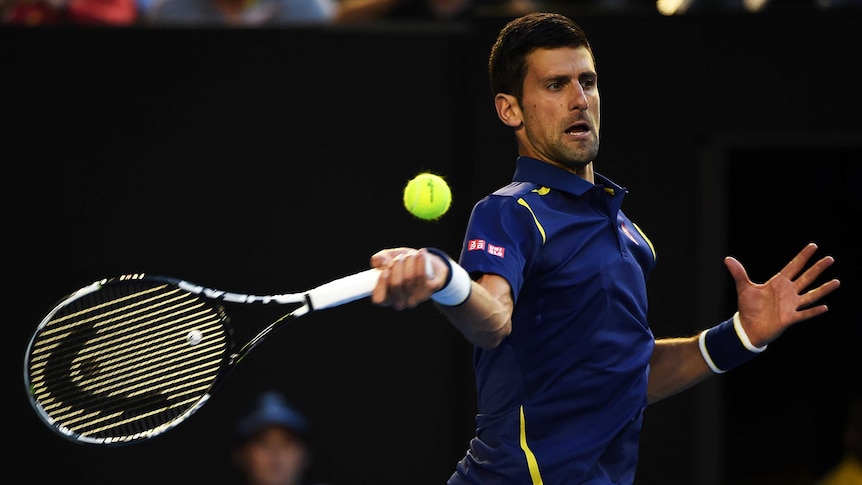 Novak Djokovic hits a forehand