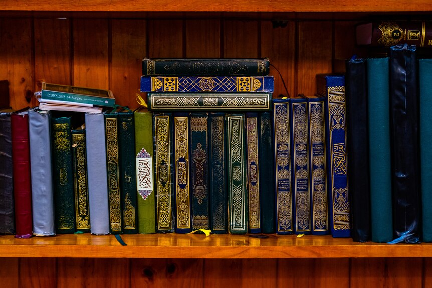 Islamic books on a shelf at the mosque in Heidelberg.